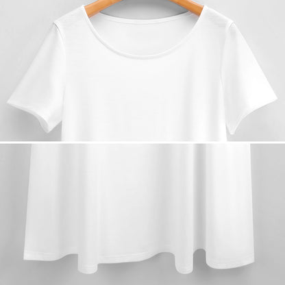 A white t-shirt hanging on a wooden hanger against a plain background.