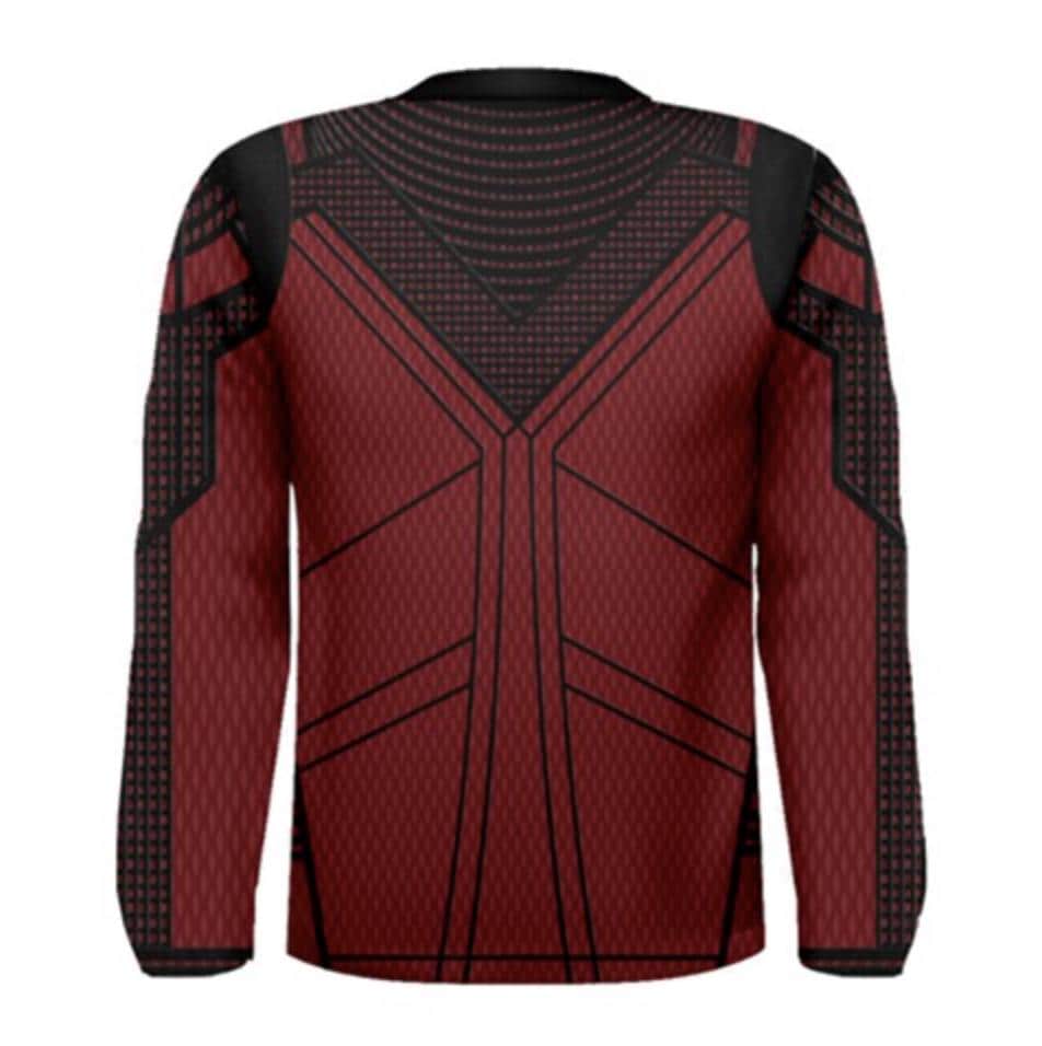 a red and black sweater with a pattern on it