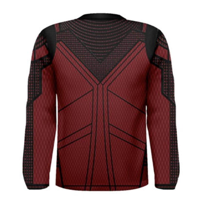 a red and black sweater with a pattern on it